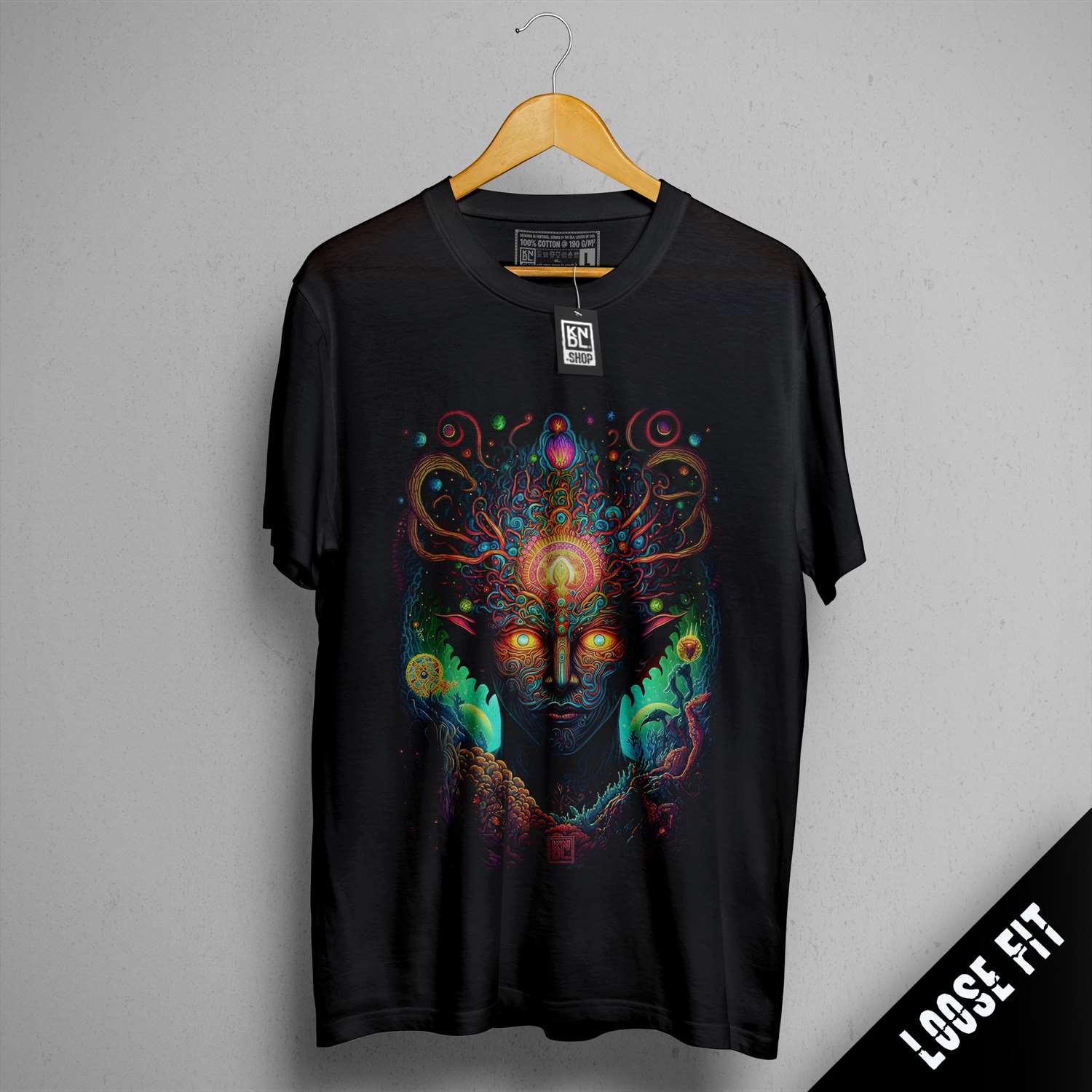 a black t - shirt with an image of a woman's face on it