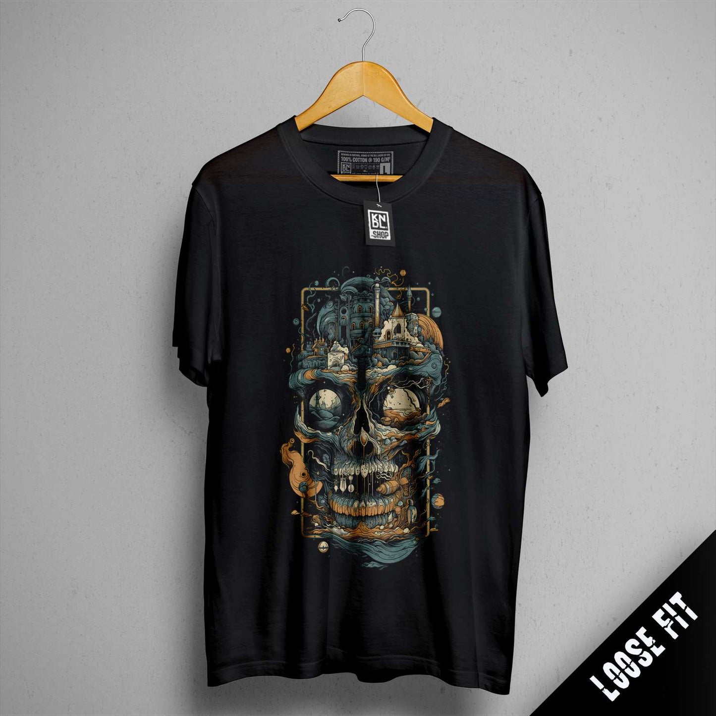 a black t - shirt with a picture of a skull on it