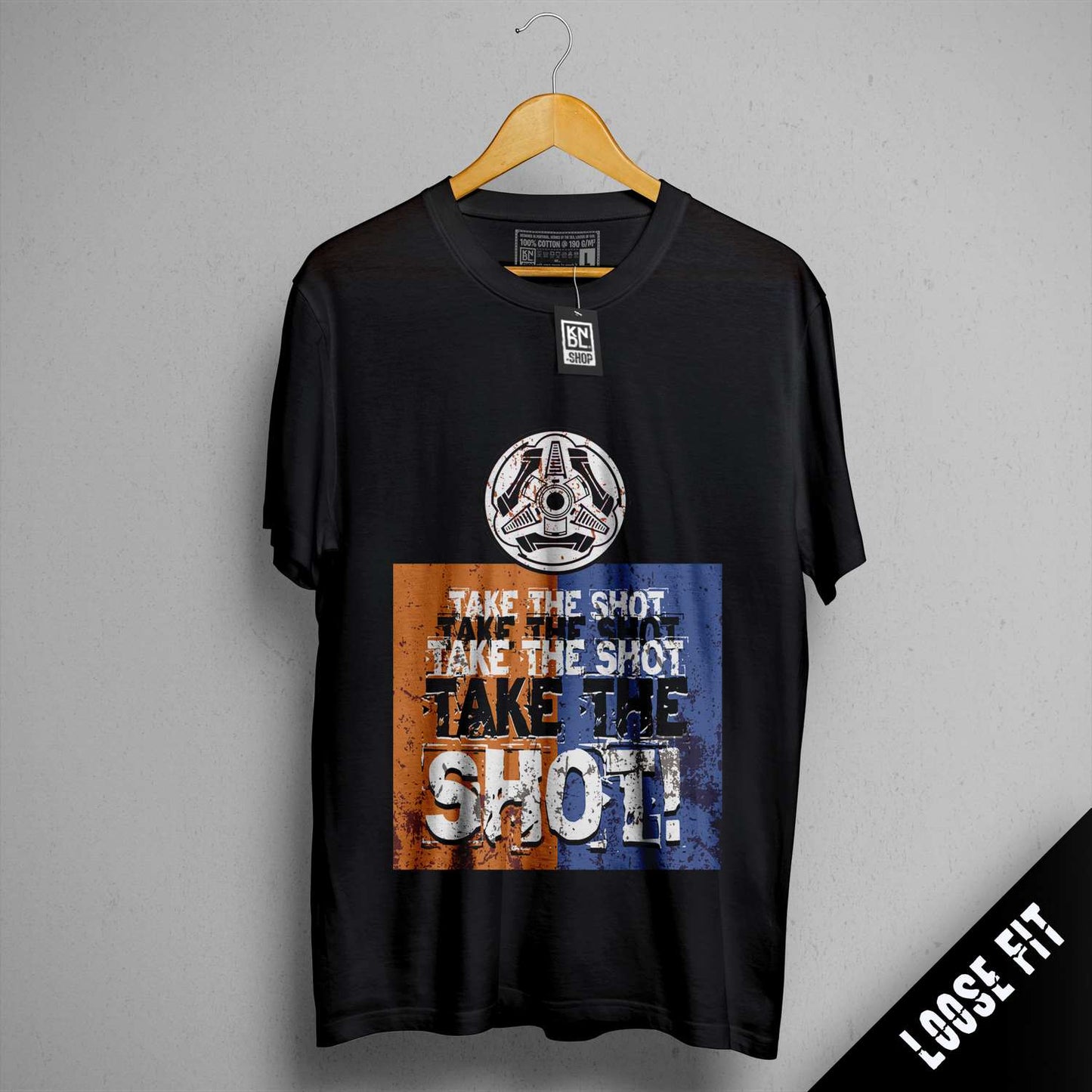 a black t - shirt with the words take the shot on it
