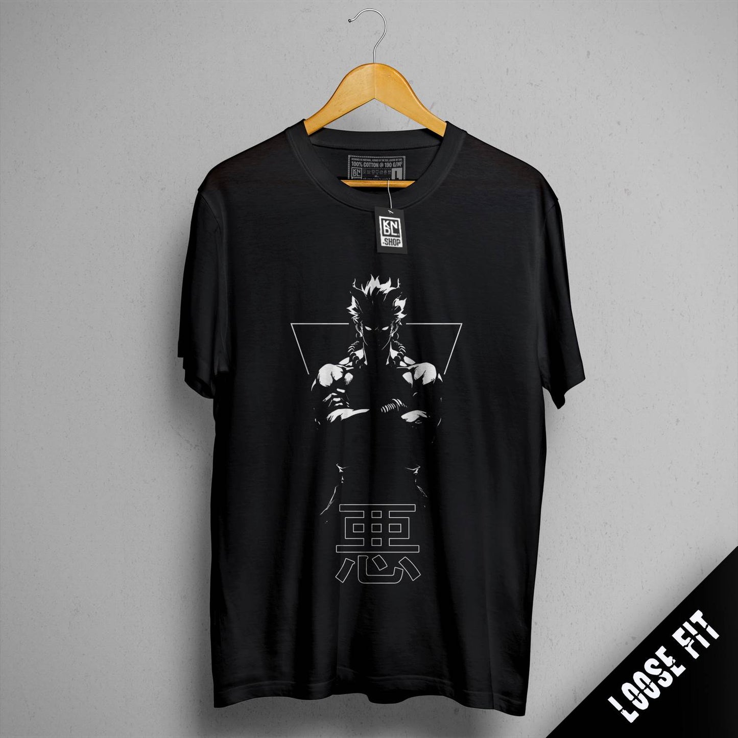 a black t - shirt with a picture of a man holding a gun
