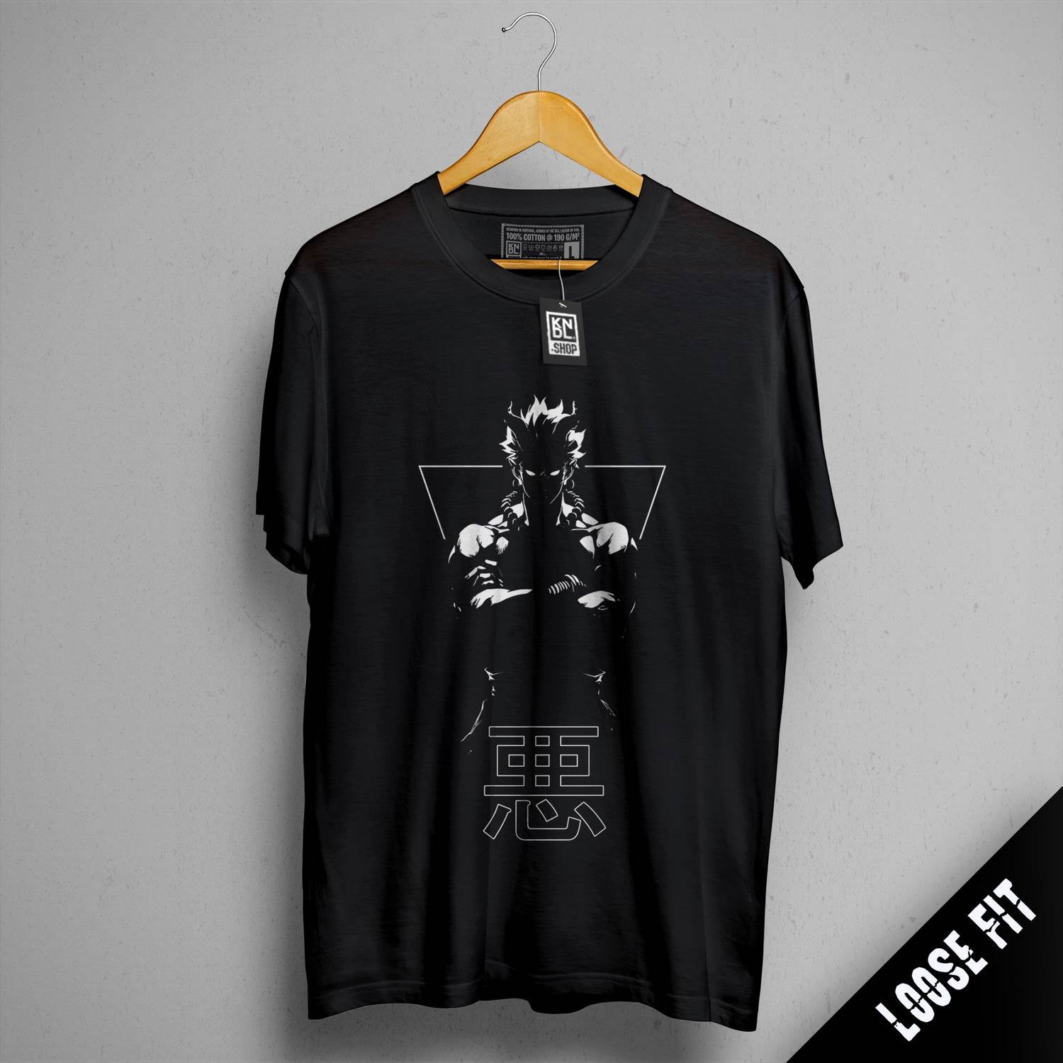 a black t - shirt with a picture of a man holding a gun