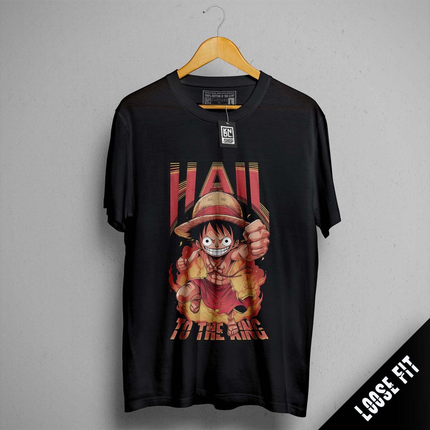 a black t - shirt with a picture of one piece on it