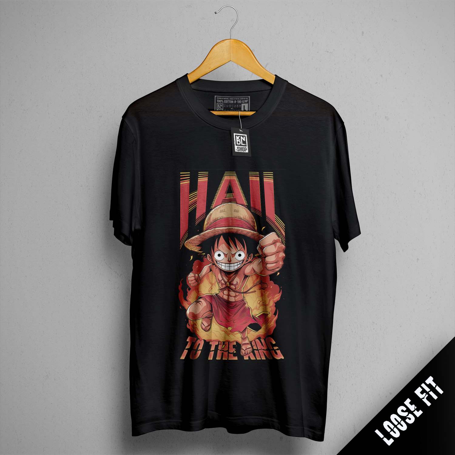a black t - shirt with a picture of one piece on it