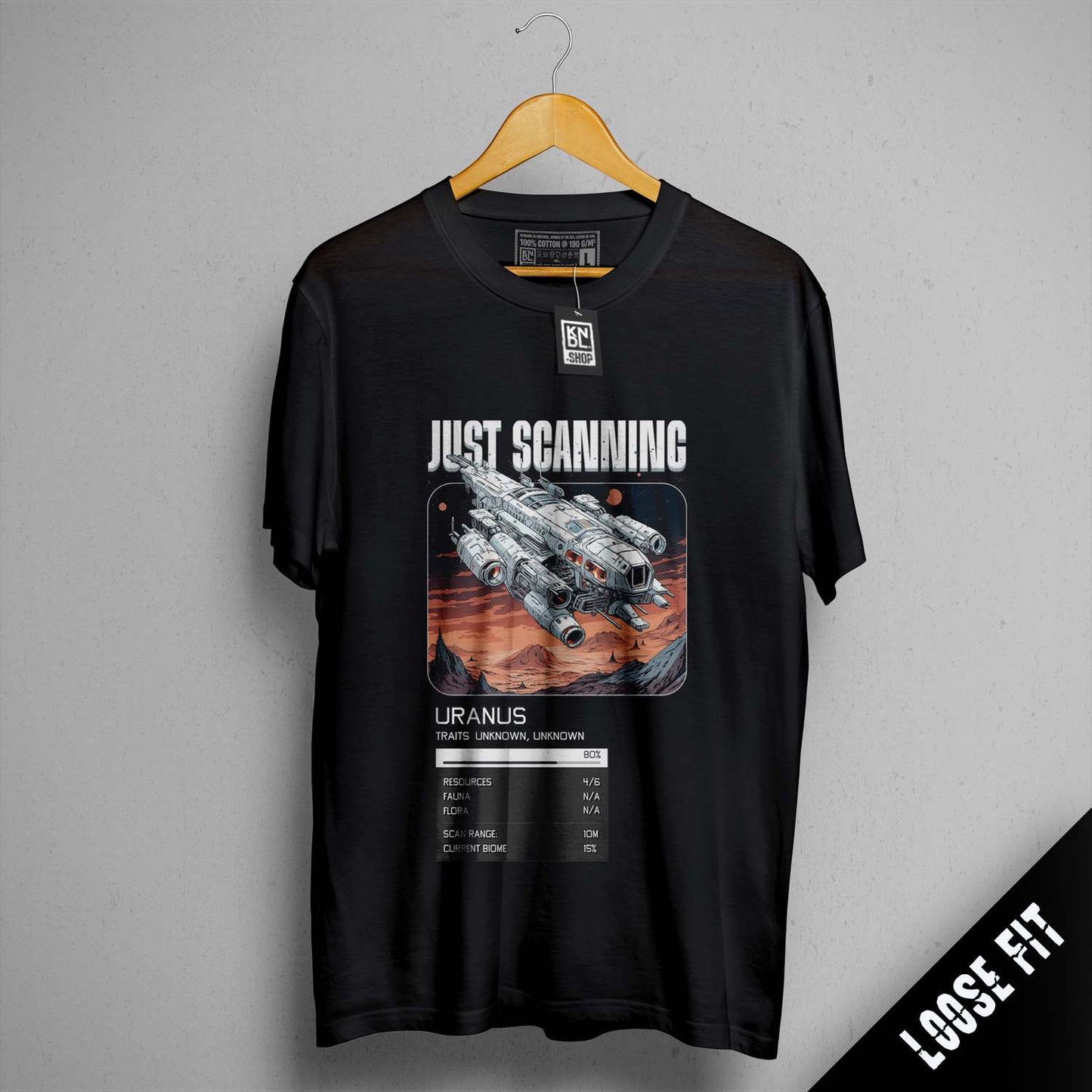 a black t - shirt with a picture of a space shuttle on it