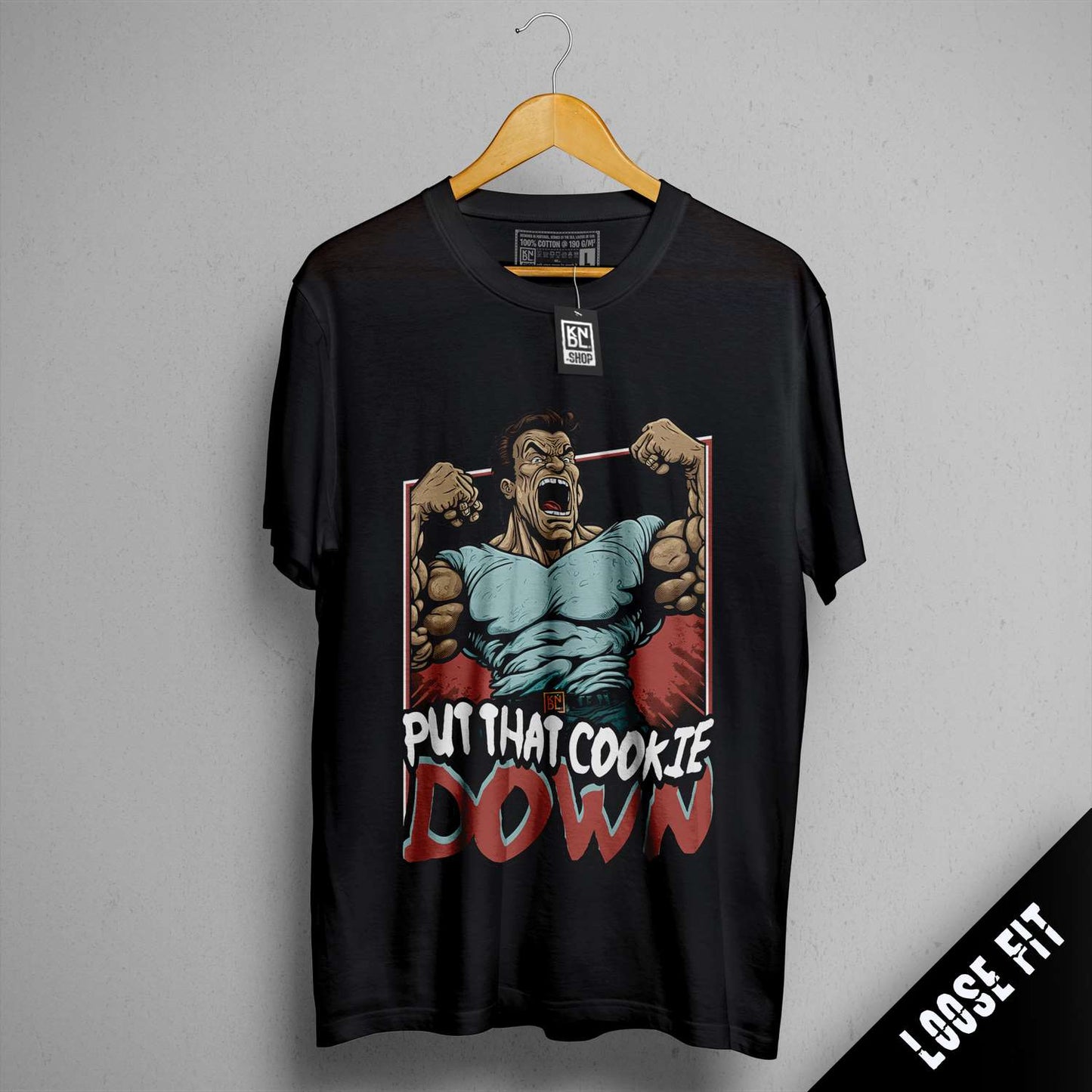 a black t - shirt with a picture of a man doing a punch that cookie