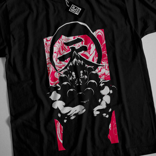 a black t - shirt with a picture of a person holding a steering wheel