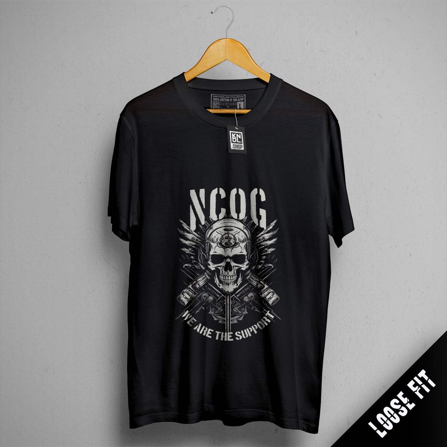 a black t - shirt with a skull on it