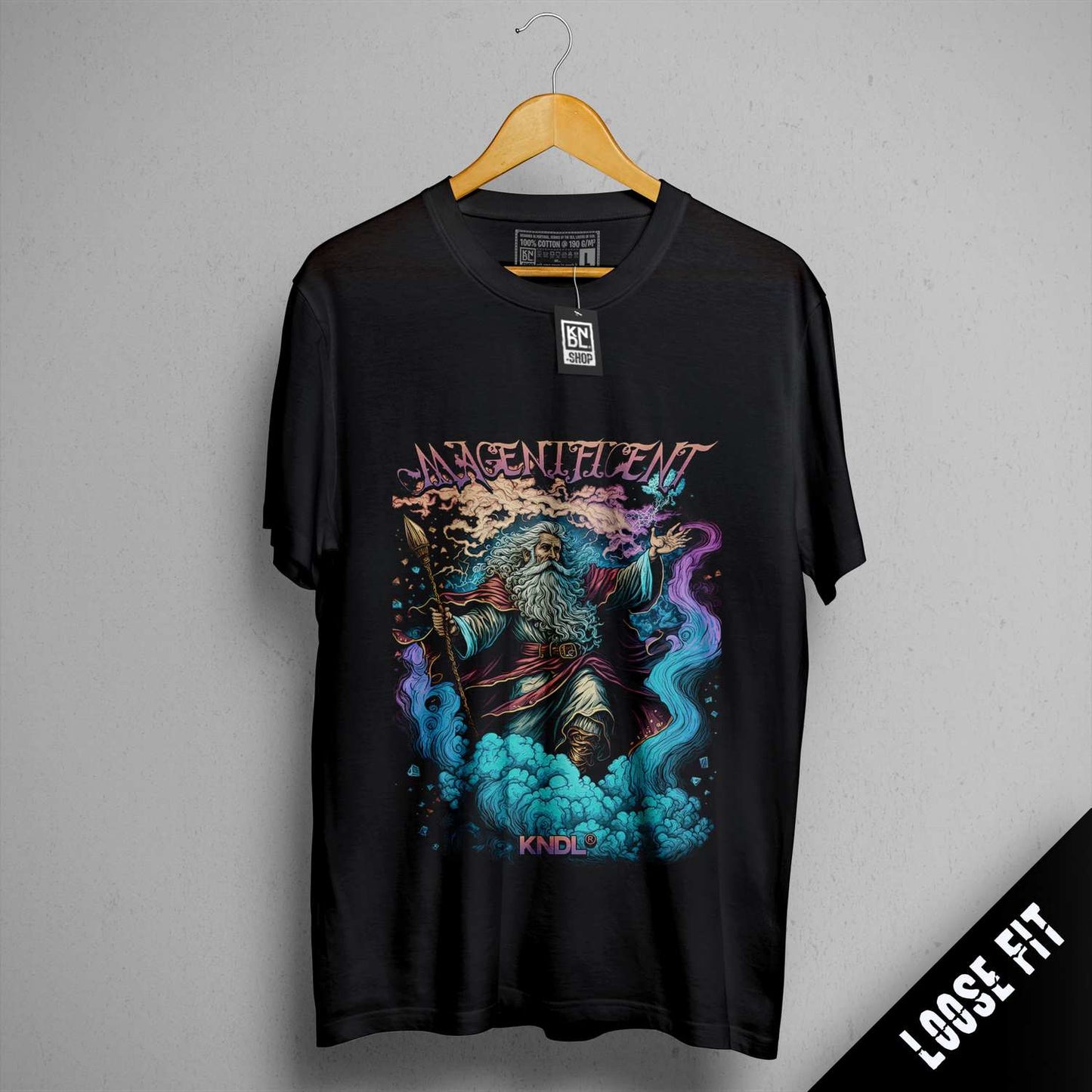 a black shirt with a picture of a demon on it