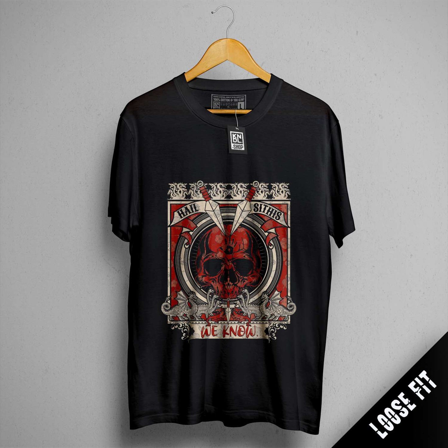 a black t - shirt with a picture of a skull on it