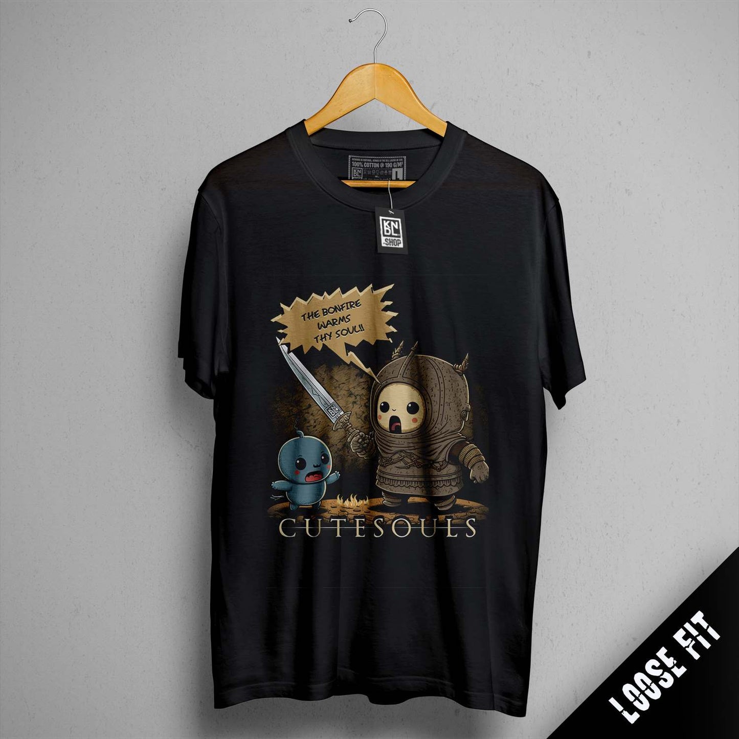 a black shirt with a picture of a skeleton holding a knife