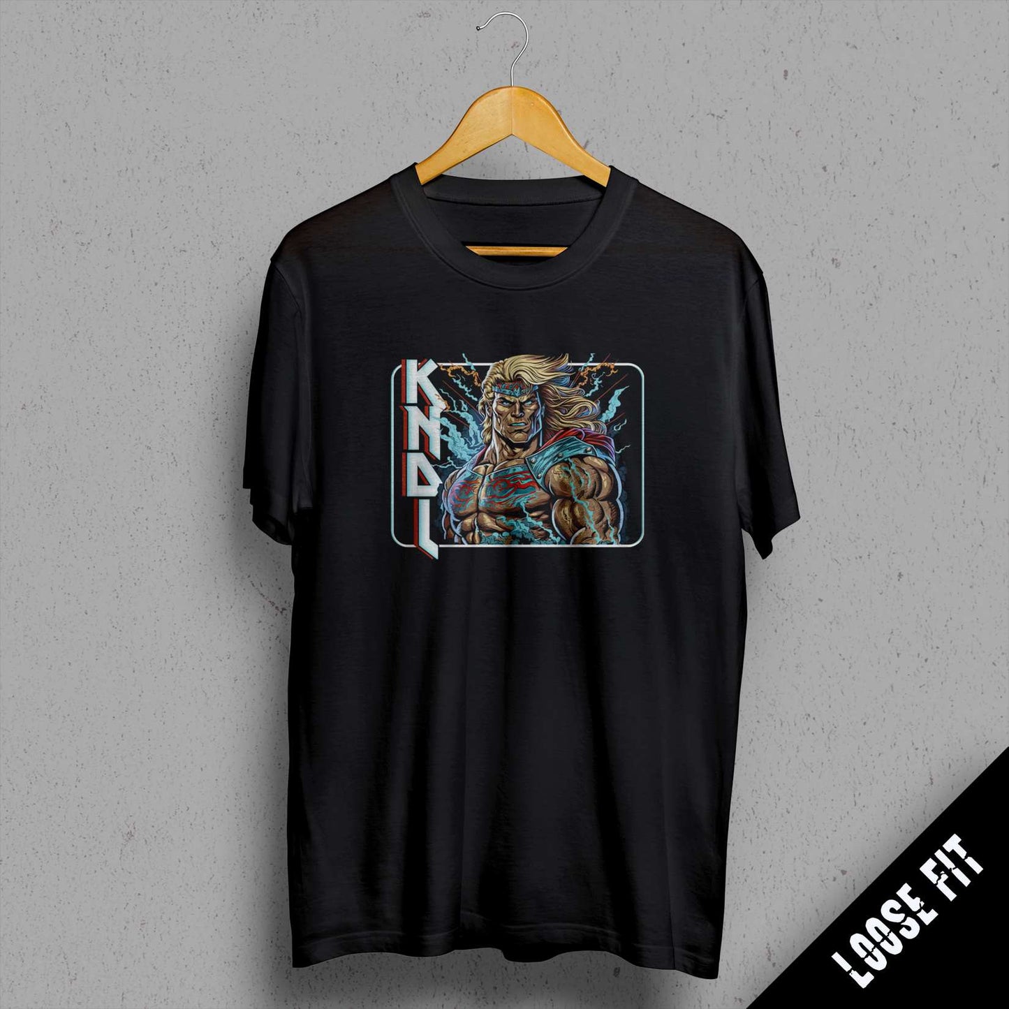 a black t - shirt with a picture of a demon on it