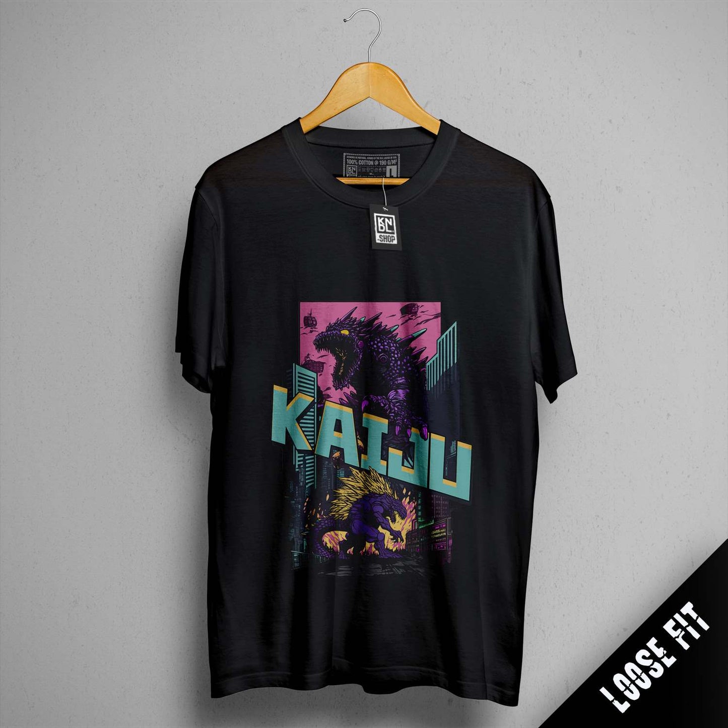 a black t - shirt with a picture of a godzilla on it