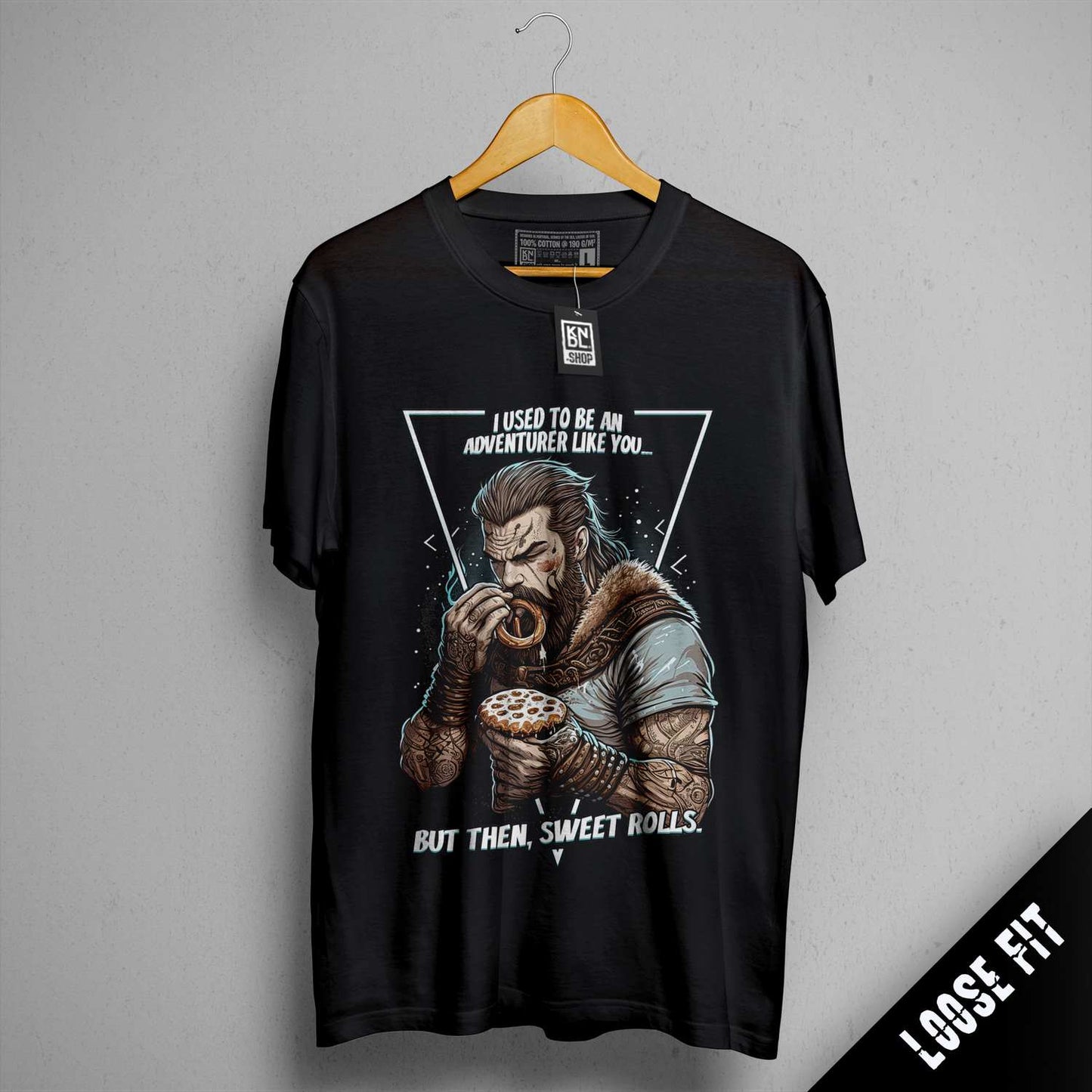 a black t - shirt with a picture of a man eating a donut