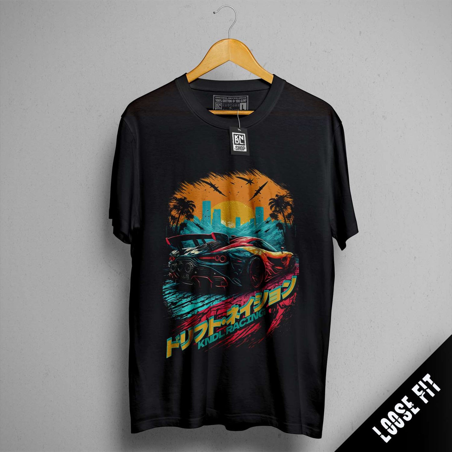 a black t - shirt with a picture of a car on it