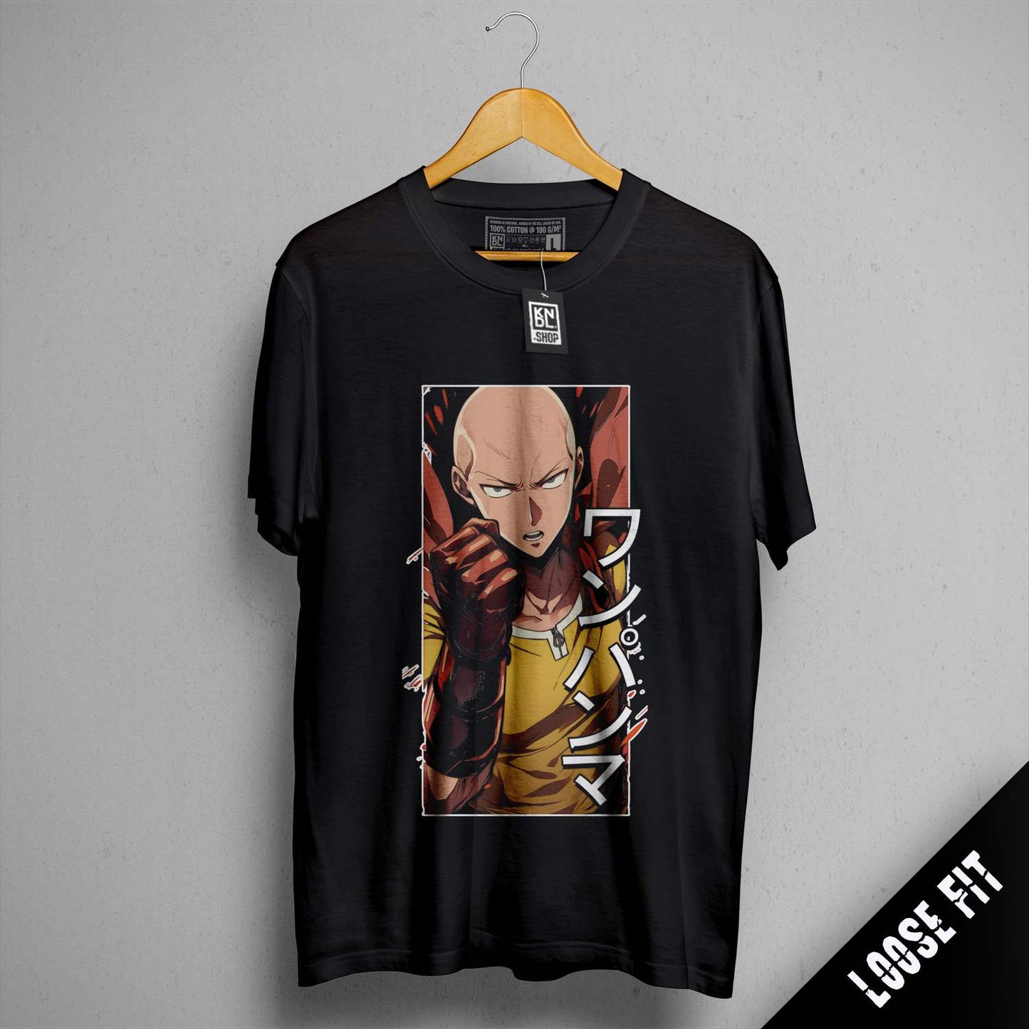 a black shirt with a picture of a man holding a gun