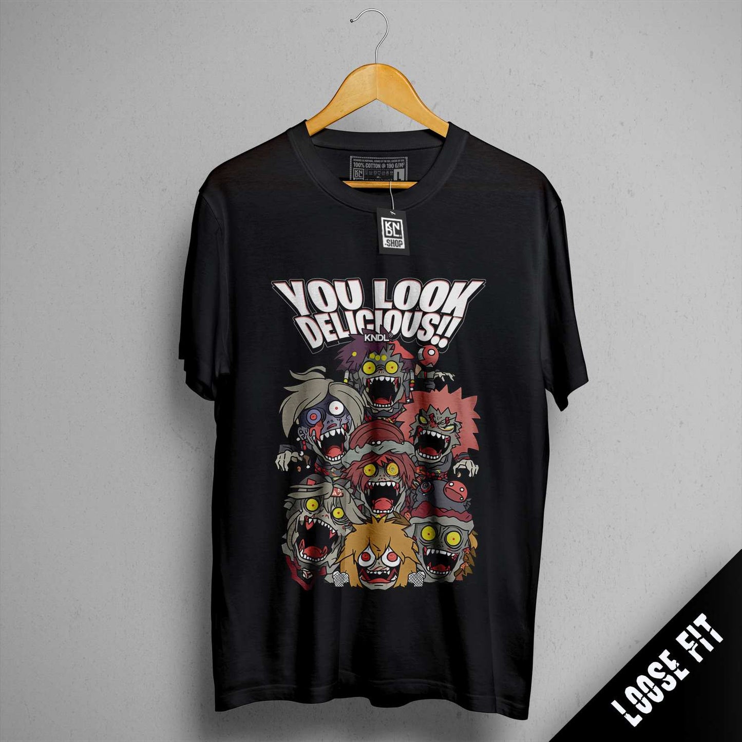 a black t - shirt with a group of cartoon characters on it