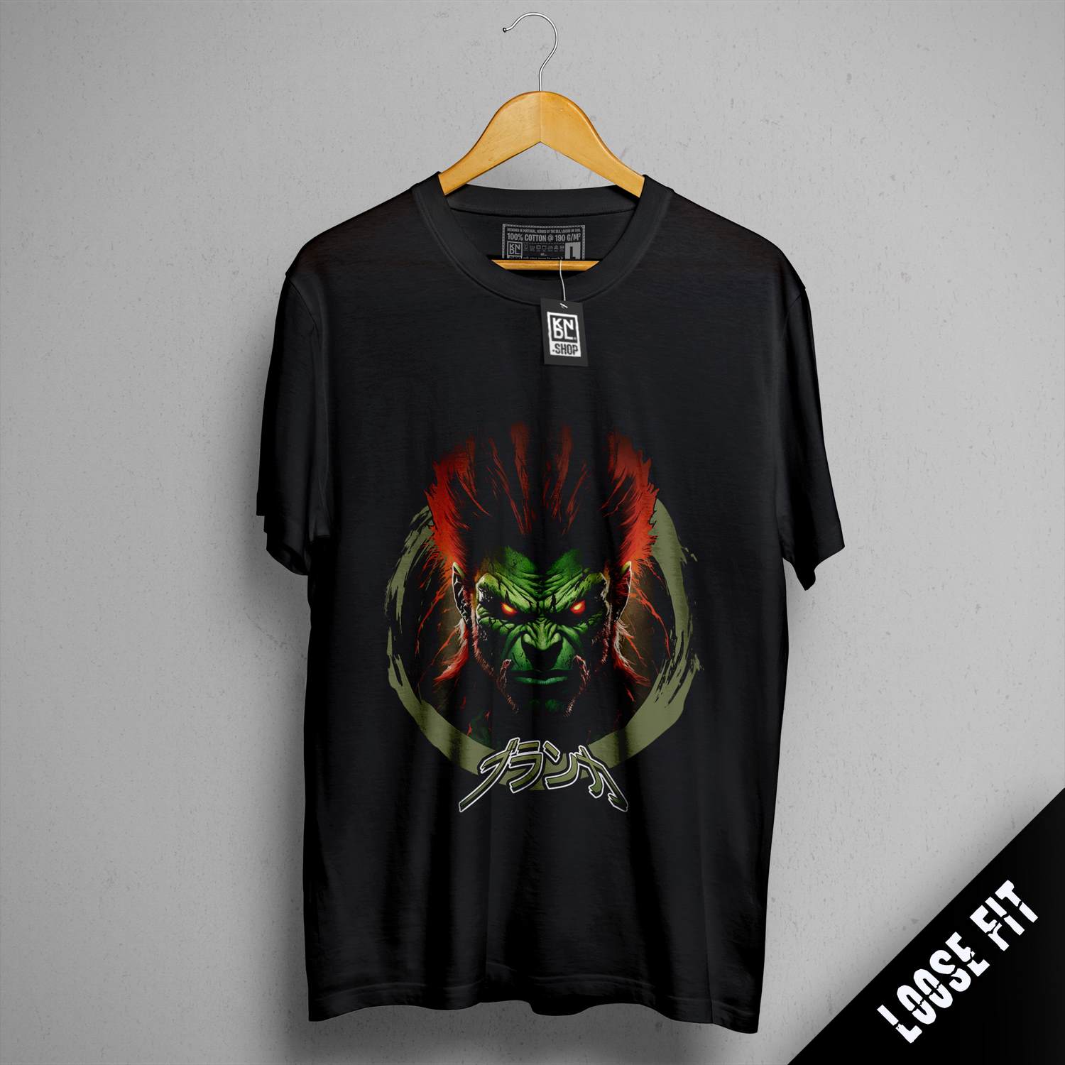 a black t - shirt with a picture of a demon on it