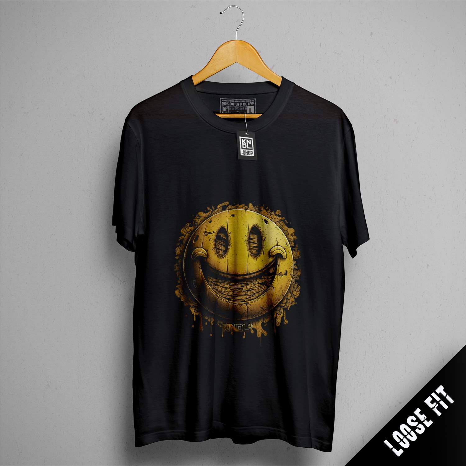 a black shirt with a smiley face on it