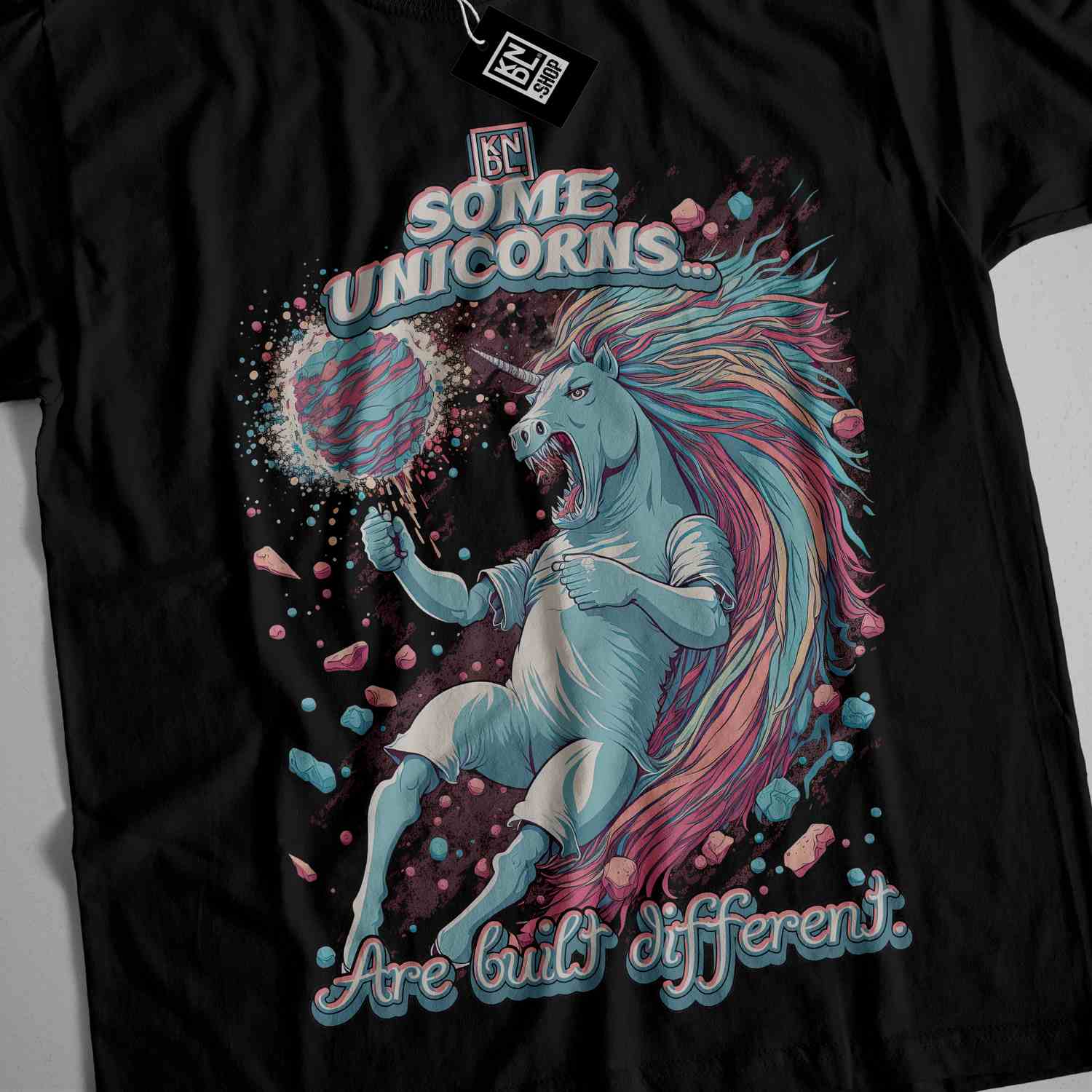 a black t - shirt with a unicorn on it