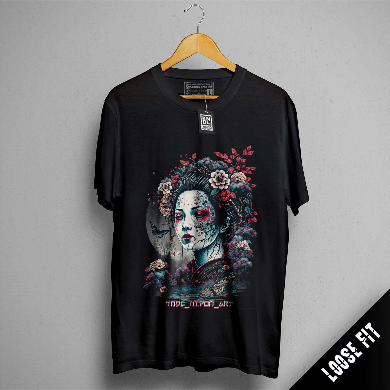 a black t - shirt with a picture of a woman's face and flowers