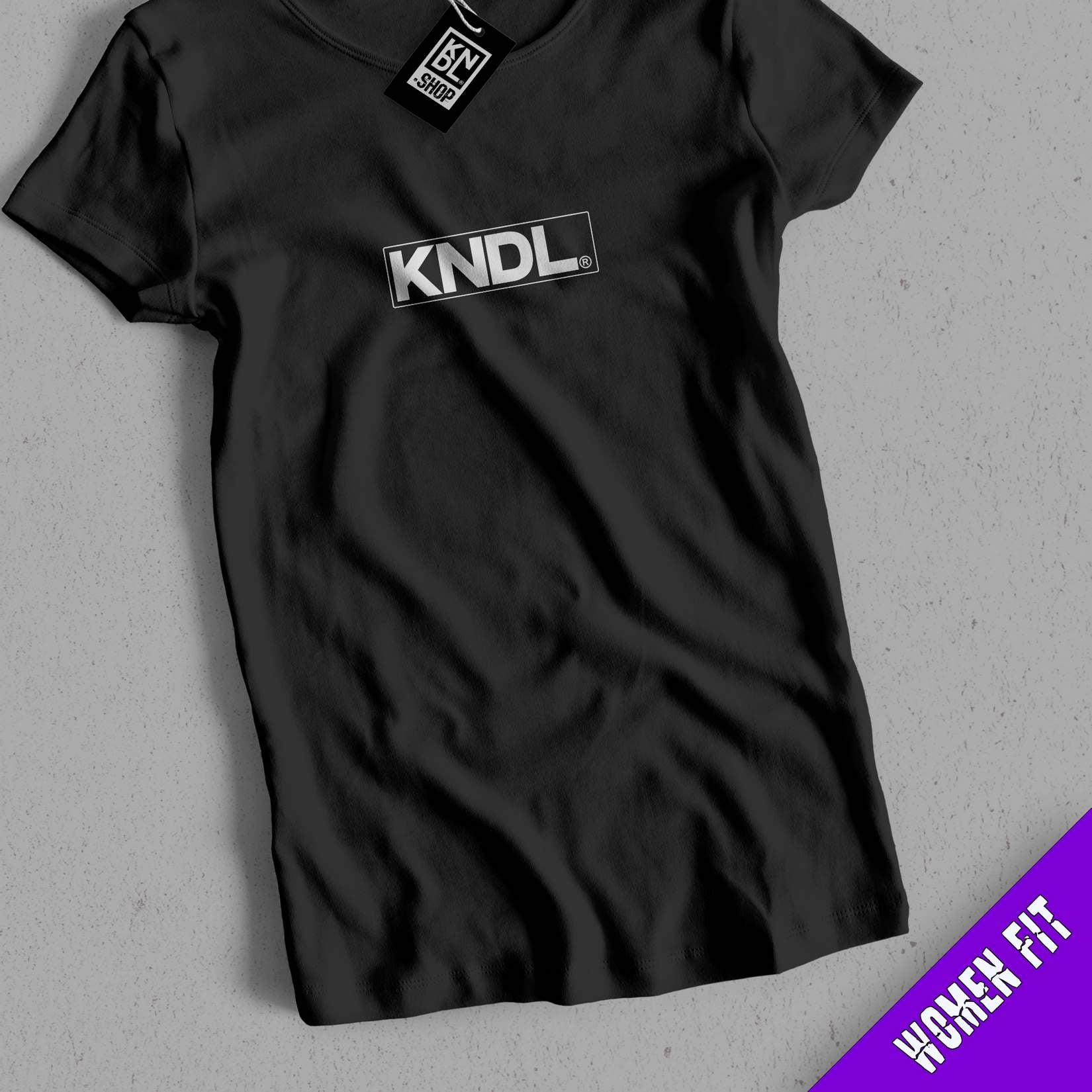 a black t - shirt with the words kindl on it