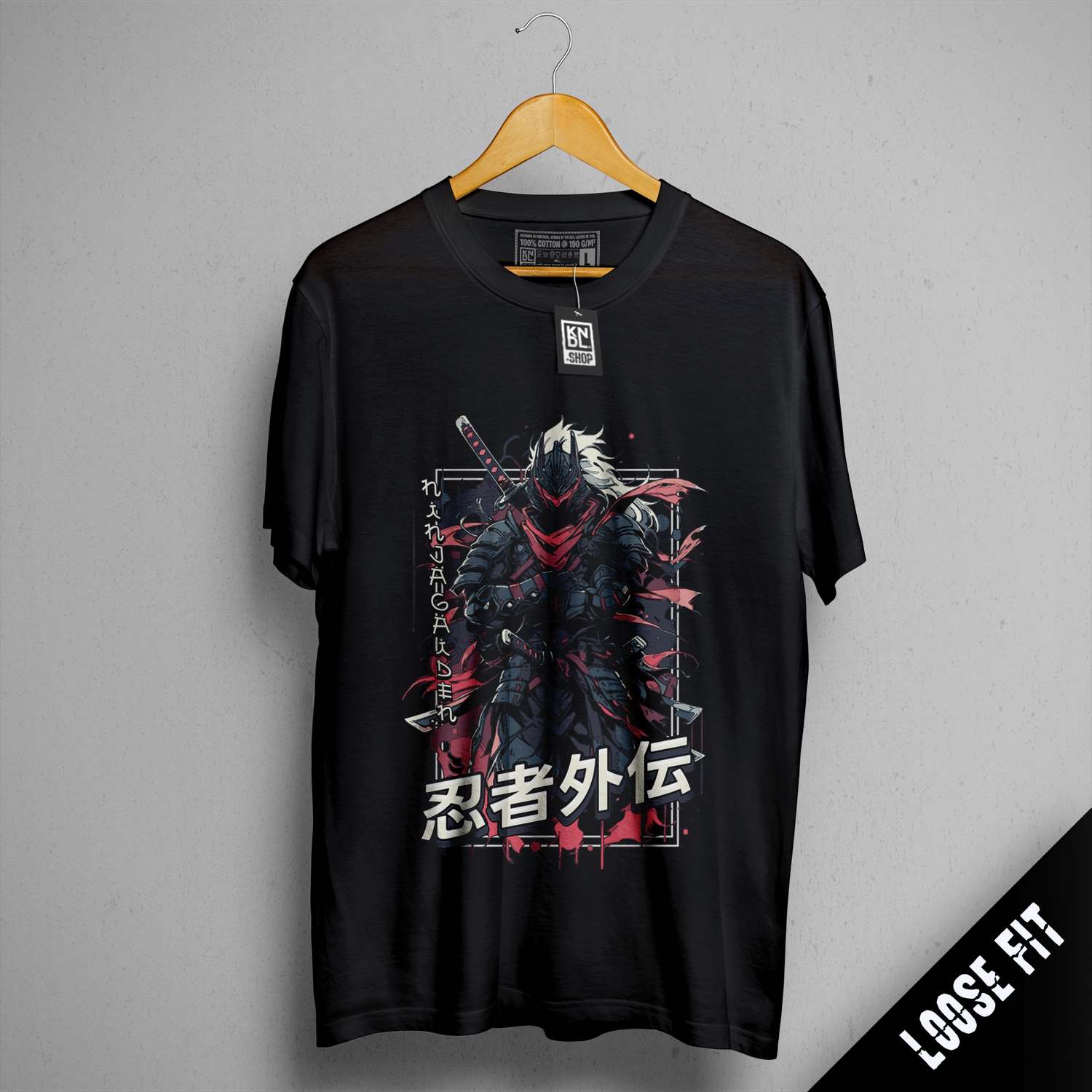 a black t - shirt with a picture of a demon on it