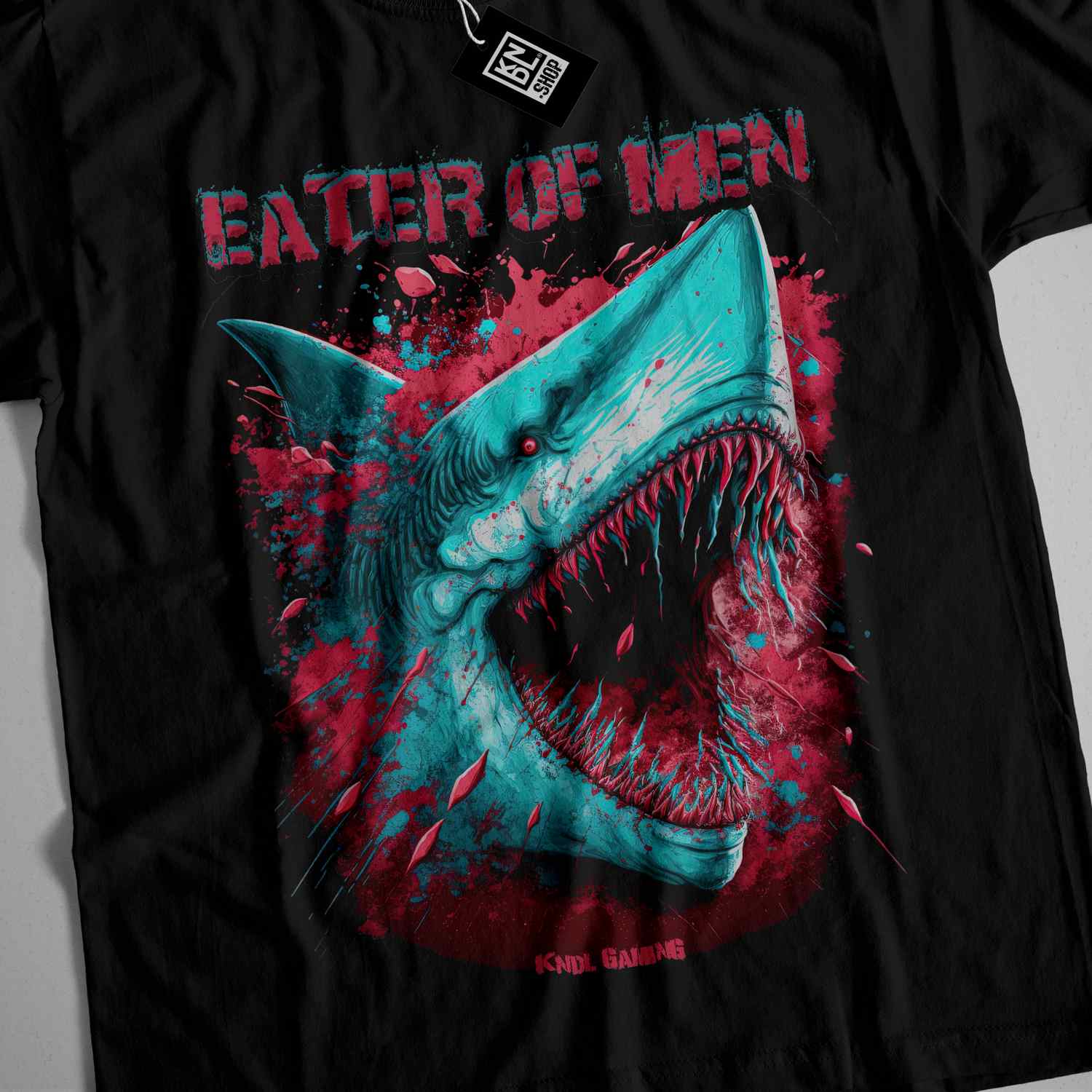 a black t - shirt with a shark on it